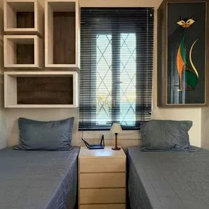 Casa com 243m², 4 dormitórios, 1 suíte, 2 vagas no bairro Stan em Torres para Comprar