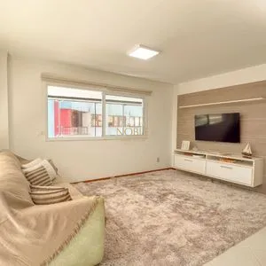 Apartamento com 125m², 3 dormitórios, 1 suíte, 2 vagas no Elegance em Torres para Comprar
