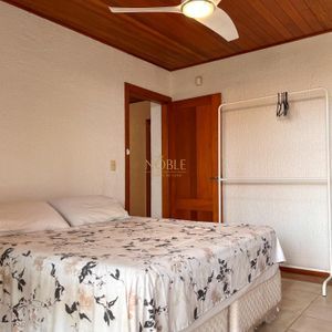 Casa, 4 dormitórios, 2 suítes, 3 vagas no bairro Praia Grande em Torres para Comprar