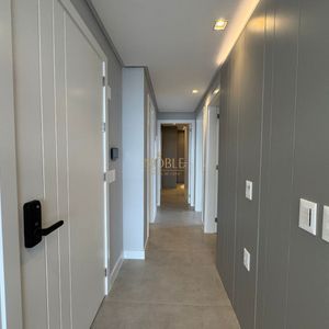 Apartamento com 102m², 3 dormitórios, 1 suíte, 2 vagas no Maui Residencial em Torres para Comprar