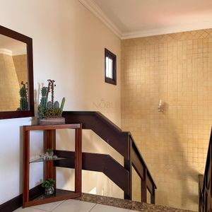 Casa com 300m², 3 dormitórios, 3 suítes, 4 vagas no bairro Centro em Torres para Comprar