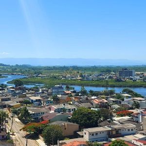 Apartamento com 82m², 2 dormitórios, 2 suítes, 2 vagas no Punta Del Sole em Torres para Comprar