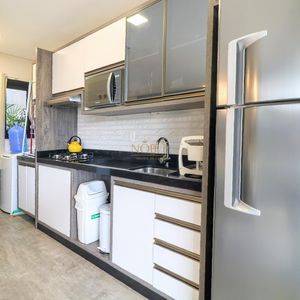 Apartamento com 128m², 3 dormitórios, 1 suíte, 2 vagas no Casa Carmel em Torres para Comprar