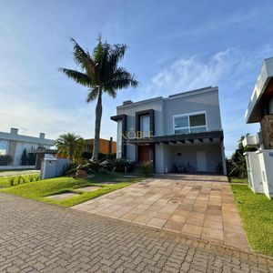 Casa de Condomínio com 187m², 3 dormitórios, 1 suíte, 4 vagas no Reserva das Águas em Torres para Comprar