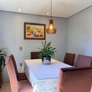 Casa com 228m², 3 dormitórios, 1 suíte, 2 vagas no bairro Stan em Torres para Comprar