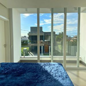 Casa de Condomínio, 4 dormitórios, 4 suítes, 2 vagas no Condomínio Ilhas Park em Torres para Comprar