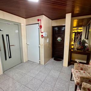 Apartamento com 65m², 2 dormitórios, 1 vaga no Edifício Porto Seguro em Torres para Comprar