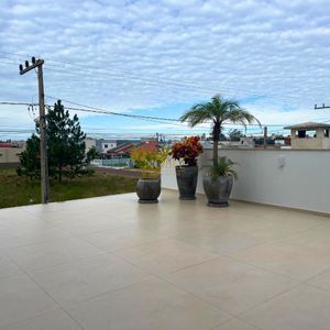 Casa com 180m², 3 dormitórios, 1 suíte, 4 vagas no bairro Novo Passo em Passo de Torres para Comprar