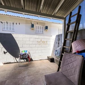 Sobrado com 54m², 3 dormitórios, 1 vaga no Residencial Bela Vista em Torres para Comprar