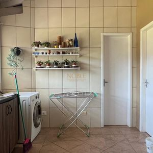 Sobrado com 290m², 4 dormitórios, 1 suíte, 2 vagas no bairro Igra Norte em Torres para Comprar