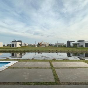 Casa de Condomínio com 228m², 3 dormitórios, 3 suítes, 2 vagas no Reserva das Águas em Torres para Comprar