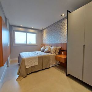 Apartamento com 102m², 3 dormitórios, 1 suíte, 2 vagas no Maui Residencial em Torres para Comprar