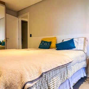 Apartamento com 60m², 2 dormitórios, 1 suíte, 1 vaga no Aston em Torres para Comprar