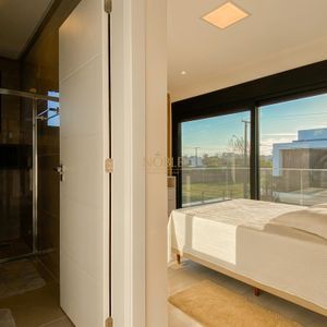 Casa de Condomínio com 375m², 4 dormitórios, 4 suítes, 2 vagas no Condomínio Ilhas Park em Torres para Comprar