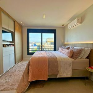 Sobrado com 93m², 2 dormitórios, 2 suítes, 1 vaga no bairro Morada das Palmeiras em Torres para Comprar