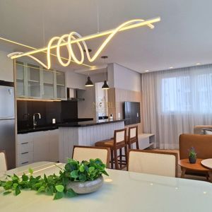 Apartamento com 77m², 2 dormitórios, 1 suíte, 2 vagas no Maui Residencial em Torres para Comprar