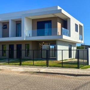 Geminado com 120m², 3 dormitórios, 1 suíte no bairro Morada das Palmeiras em Torres para Comprar