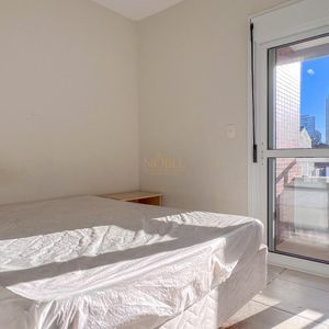 Apartamento com 100m², 2 dormitórios, 1 suíte, 1 vaga no Cayman em Torres para Comprar