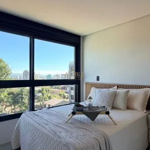 Apartamento com 64m², 2 dormitórios, 1 suíte, 1 vaga no Aston em Torres para Comprar
