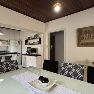 Casa com 136m², 3 dormitórios, 1 suíte, 2 vagas no bairro Praia da Cal em Torres para Comprar