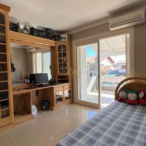 Sobrado com 290m², 4 dormitórios, 1 suíte, 2 vagas no bairro Igra Norte em Torres para Comprar