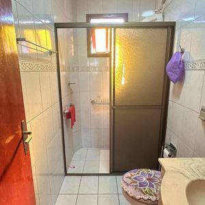 Casa, 6 dormitórios, 2 vagas no bairro Praia da Cal em Torres para Comprar