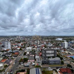 Apartamento com 70m², 2 dormitórios, 1 suíte, 1 vaga no Monet em Torres para Comprar