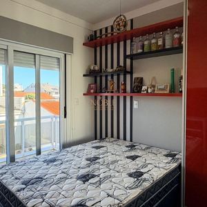 Casa com 400m², 5 dormitórios, 1 suíte, 4 vagas no bairro Stan em Torres para Comprar