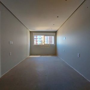 Apartamento com 114m², 3 dormitórios, 1 suíte, 2 vagas no Titanium em Torres para Comprar