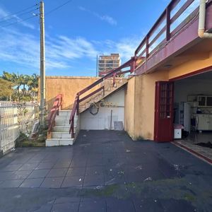 Casa, 6 dormitórios, 2 vagas no bairro Praia da Cal em Torres para Comprar