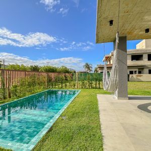 Casa de Condomínio com 350m², 3 dormitórios, 3 suítes, 2 vagas no Condomínio Ilhas Park em Torres para Comprar