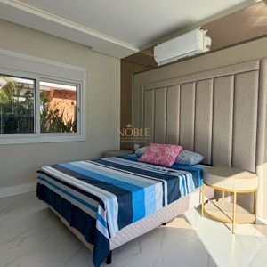 Casa de Condomínio com 233m², 3 dormitórios, 3 suítes, 2 vagas no Reserva das Águas em Torres para Comprar
