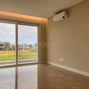 Casa de Condomínio com 432m², 4 dormitórios, 3 suítes, 2 vagas no Reserva das Águas em Torres para Comprar