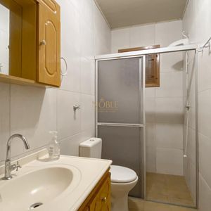 Casa com 152m², 3 dormitórios, 1 suíte, 4 vagas no bairro Praia da Cal em Torres para Comprar