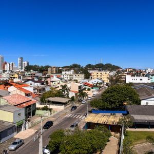 Apartamento, 2 dormitórios, 1 suíte, 1 vaga no Edifício Moma em Torres para Comprar