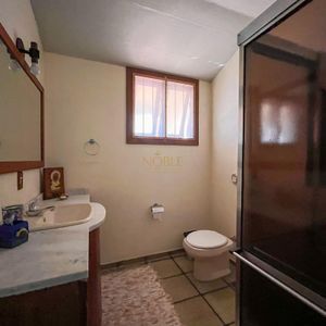 Casa com 338m², 4 dormitórios, 2 suítes, 3 vagas no bairro Centro em Passo de Torres para Comprar