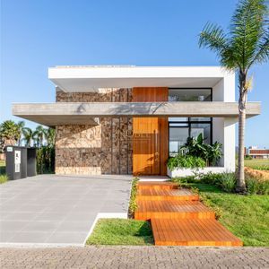 Casa de Condomínio com 218m², 3 dormitórios, 3 suítes, 2 vagas no Condomínio Ilhas Park em Torres para Comprar