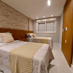 Apartamento com 108m², 3 dormitórios, 1 suíte, 2 vagas no Maui Residencial em Torres para Comprar