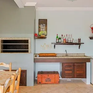 Casa, 4 dormitórios, 1 suíte, 2 vagas no bairro Itapeva Norte em Torres para Comprar