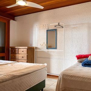 Casa, 4 dormitórios, 2 suítes, 3 vagas no bairro Praia Grande em Torres para Comprar