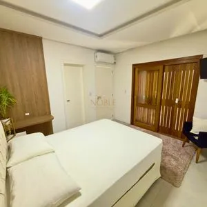 Casa com 159m², 4 dormitórios, 1 suíte no bairro Centro em Passo de Torres para Comprar