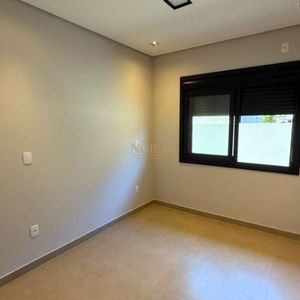 Casa com 215m², 3 dormitórios, 1 suíte, 2 vagas no bairro Morada das Palmeiras em Torres para Comprar