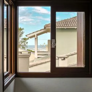 Casa, 4 dormitórios, 1 suíte, 2 vagas no bairro Itapeva Norte em Torres para Comprar