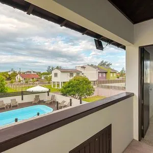 Casa, 4 dormitórios, 1 suíte, 2 vagas no bairro Itapeva Norte em Torres para Comprar
