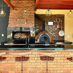 Casa com 108m², 2 dormitórios, 2 vagas no bairro Capão do Cravo em Passo de Torres para Comprar