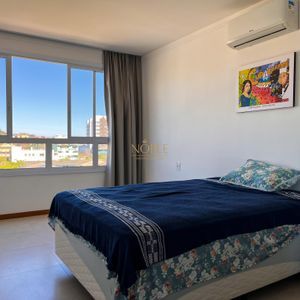 Apartamento, 2 dormitórios, 1 suíte, 1 vaga no Edifício Moma em Torres para Comprar