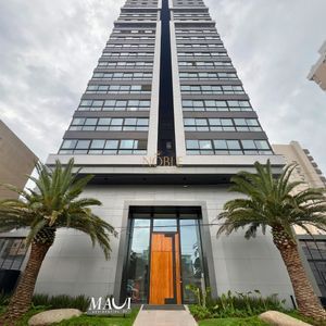 Apartamento com 77m², 2 dormitórios, 1 suíte, 2 vagas no Maui Residencial em Torres para Comprar