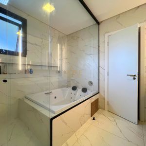 Casa de Condomínio com 350m², 3 dormitórios, 3 suítes, 2 vagas no Condomínio Ilhas Park em Torres para Comprar