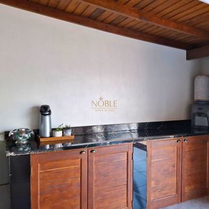 Casa com 102m², 2 dormitórios, 1 suíte, 2 vagas no bairro Igra Sul em Torres para Comprar