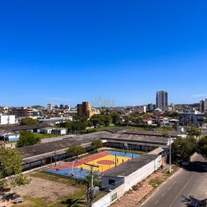Apartamento, 2 dormitórios, 1 suíte, 1 vaga no Edifício Moma em Torres para Comprar